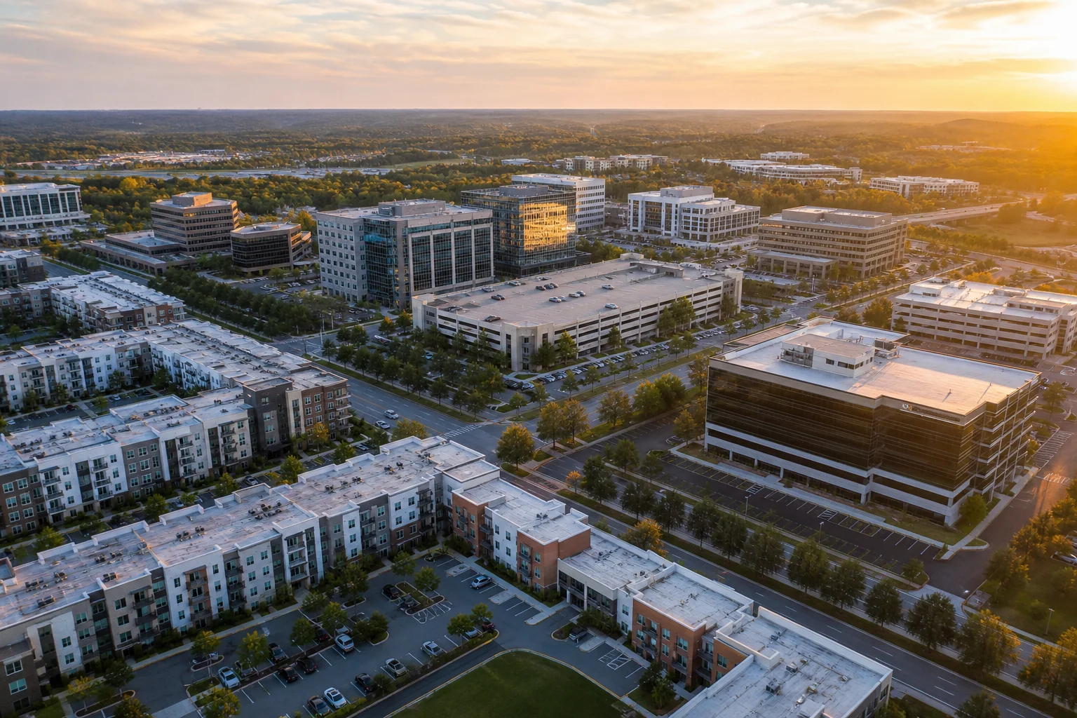 Aerial drone view of a real estate holding company portfolio showing multiple property types, representing intercompany accounting for real estate holding companies and spes